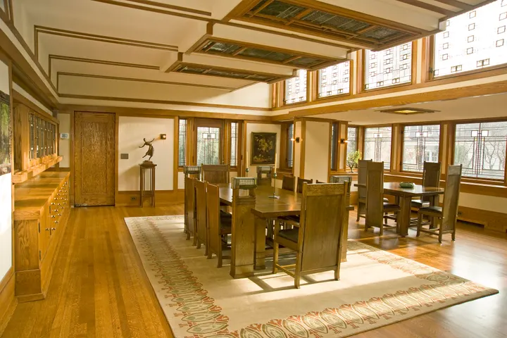 Craftsmanship archive: quartersawn oak millwork and art-glass windows in a dining room